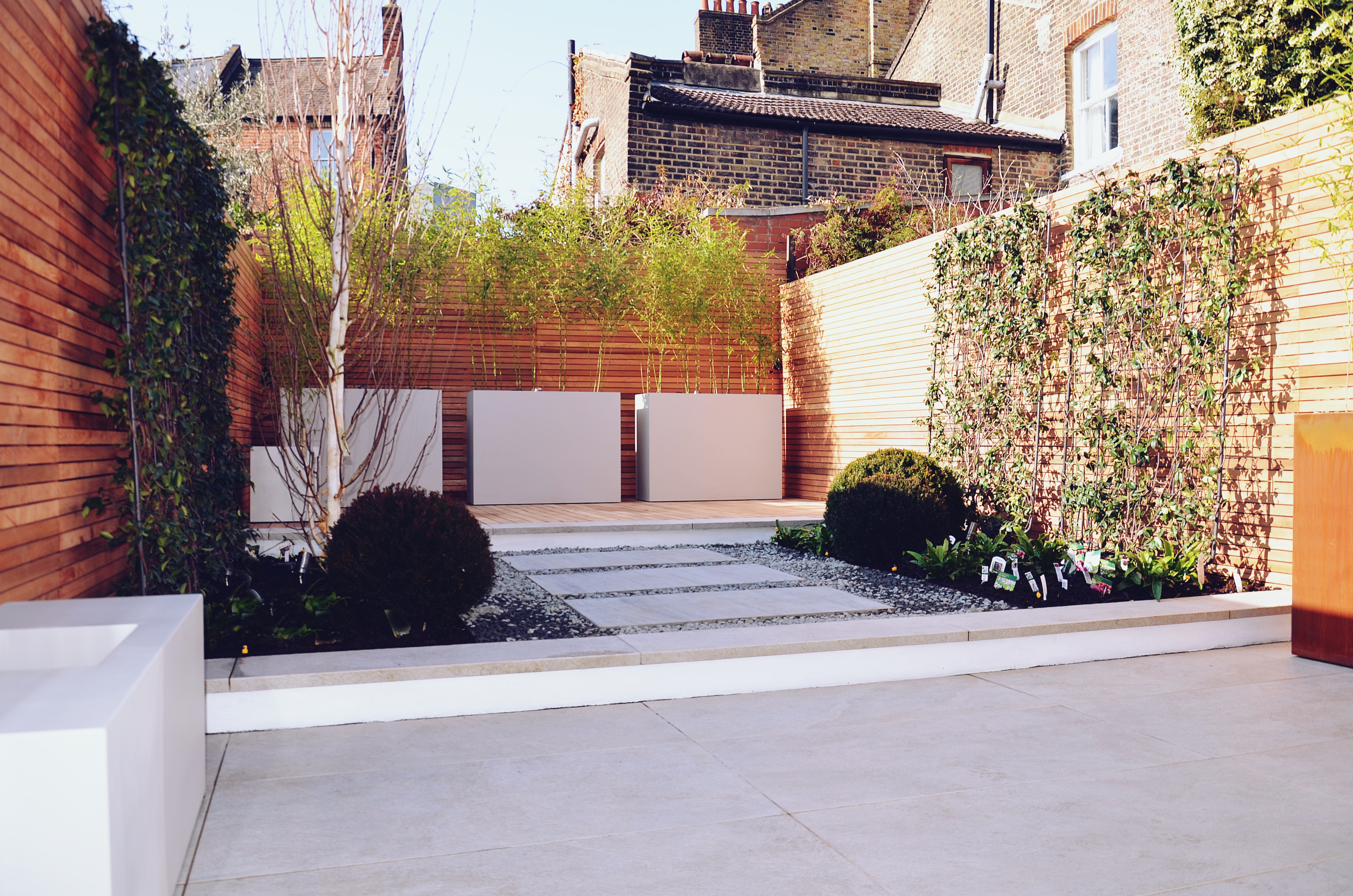 Garden builders Anewgarden Modern contemporary style London porcelain paving