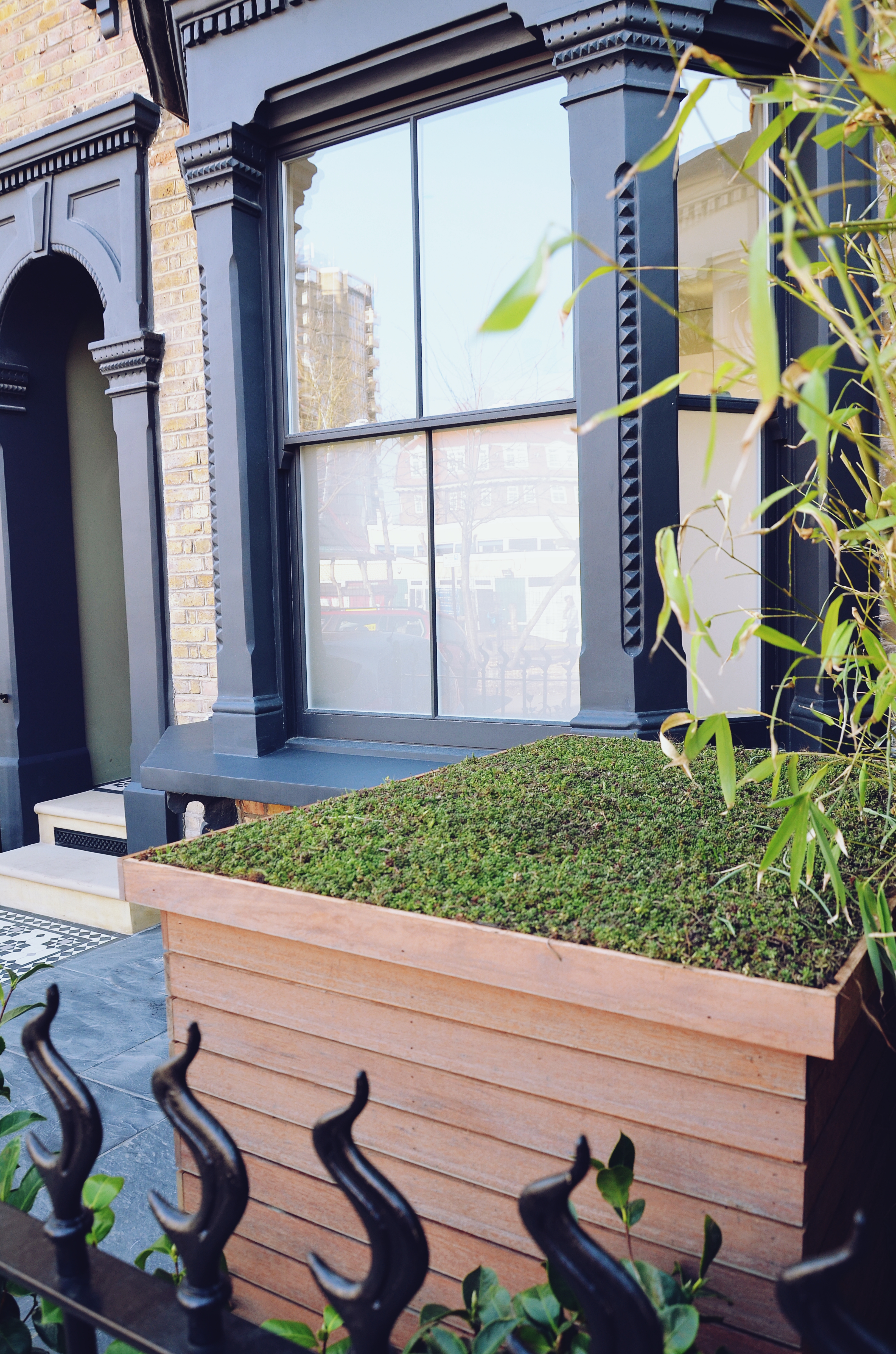 Victorian restoration with modern twist bin store living roof