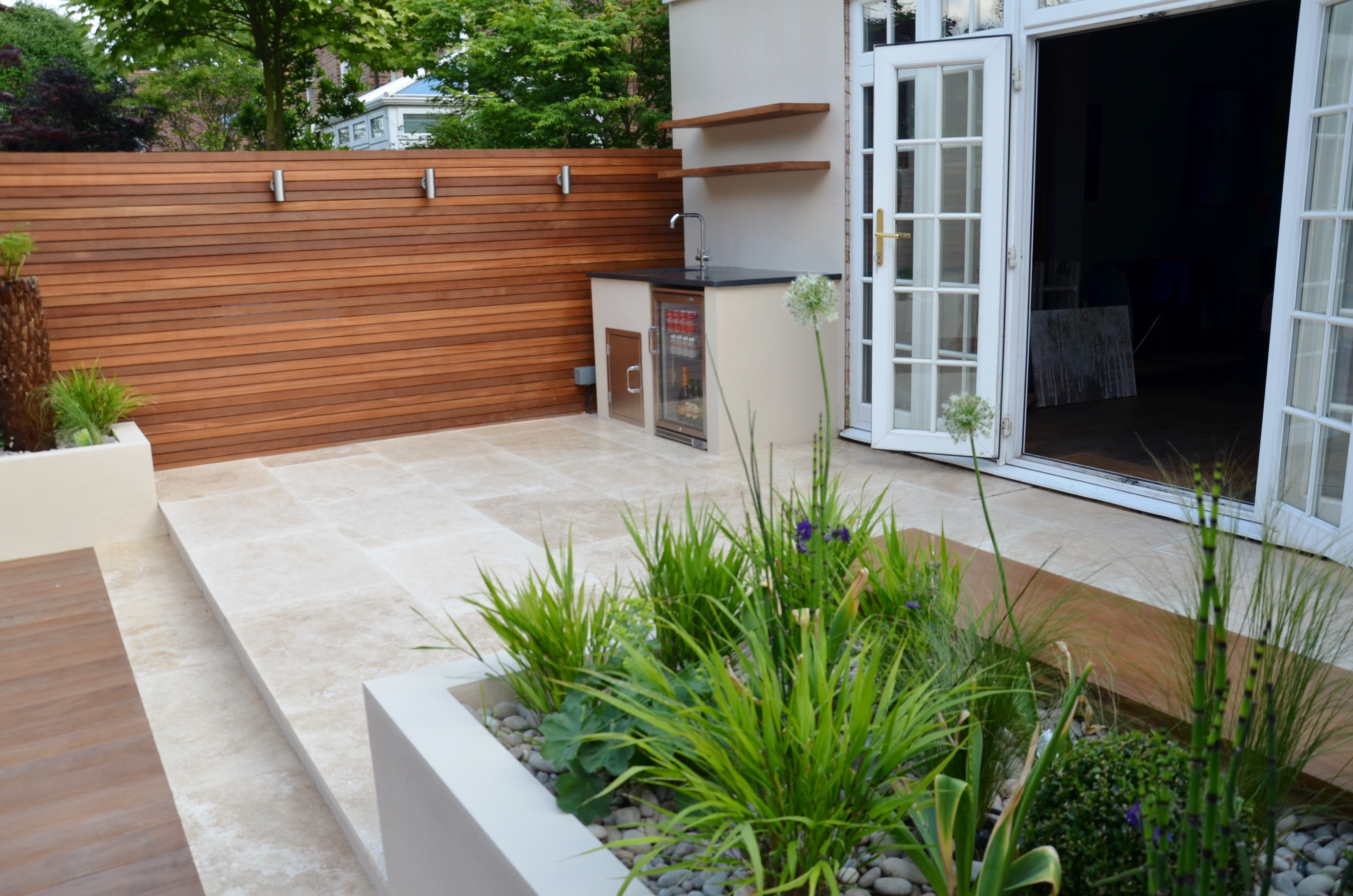 modern garden design outdoor room with kitchen seating wapping