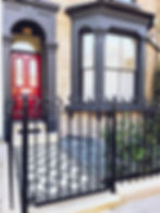 Victorian restoration with modern twist drilled rails and gate with flame finial