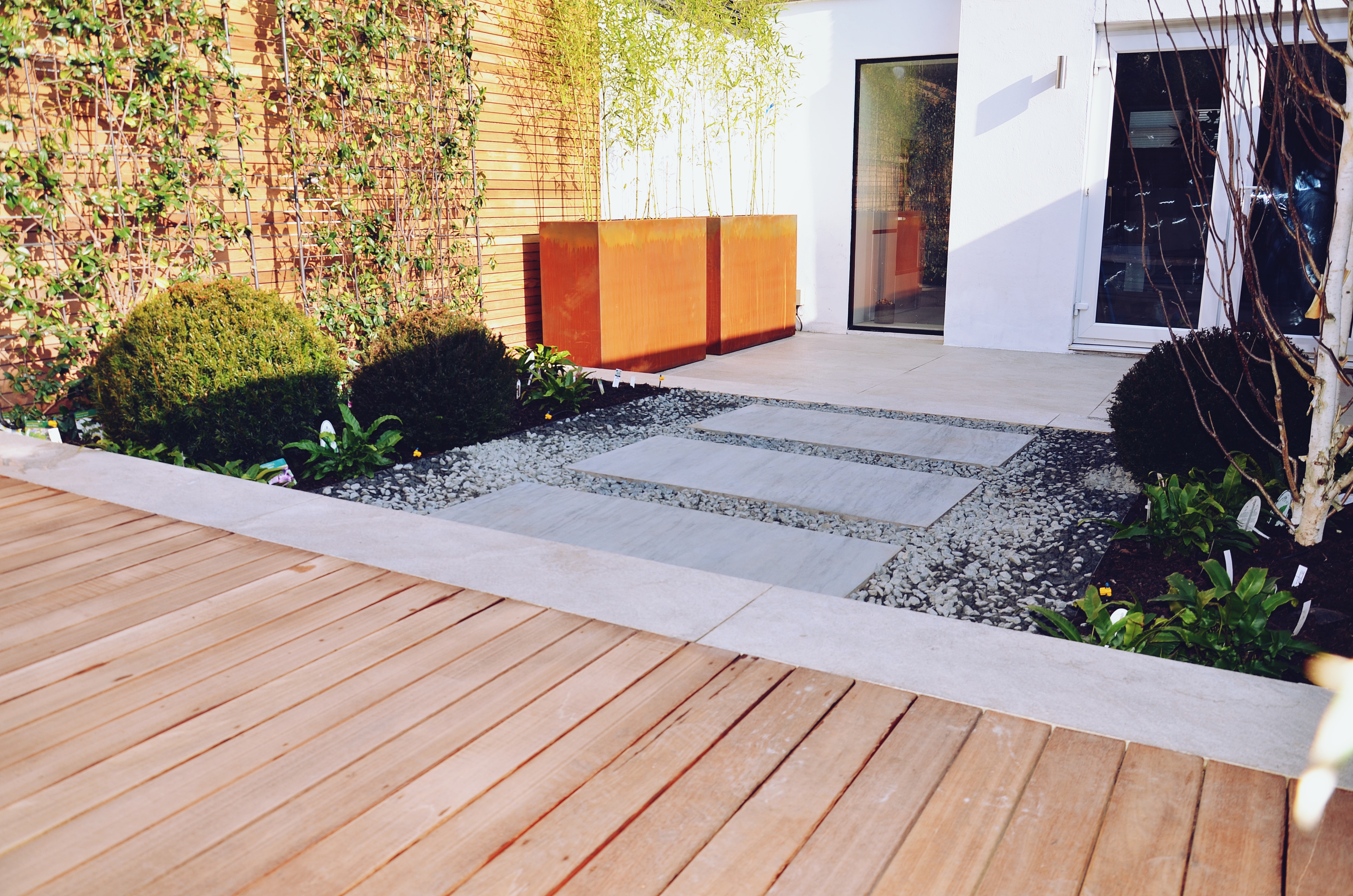 Garden builders Anewgarden Modern contemporary style London hardwood deck corten planter