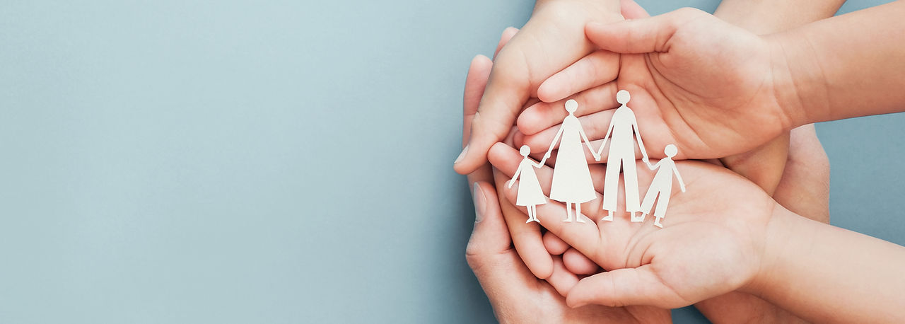 hands holding paper family cutout, family home, foster care, world mental health day, Auti