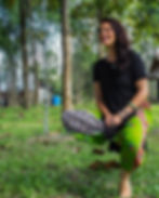 a silhouette of a meditator in an early morning light