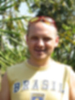 a silhouette of a meditator in an early morning light