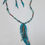 Thumbnail: Hand carved leather feather, turquoise, brown, white beads