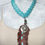 Thumbnail: Hand carved leather feather, flat turquoise beads
