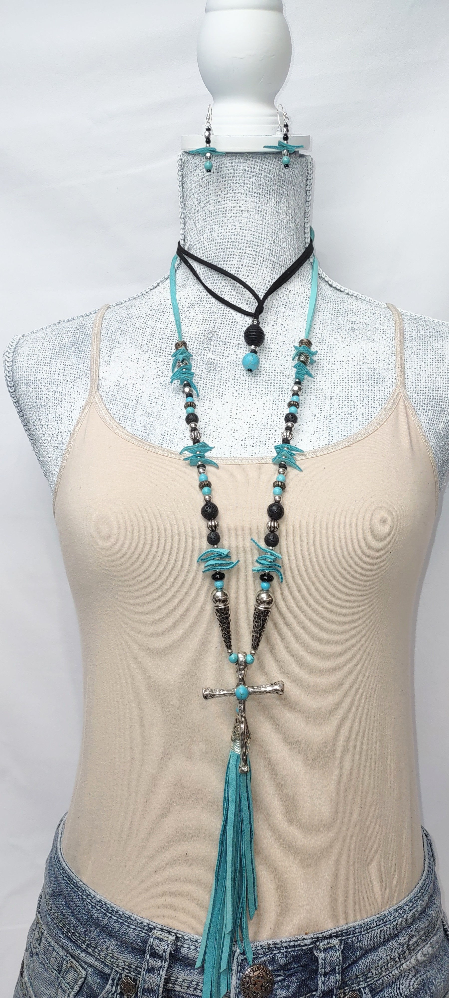 Silver cross, turquoise tassel, black, turquoise, silver & silver cone beads