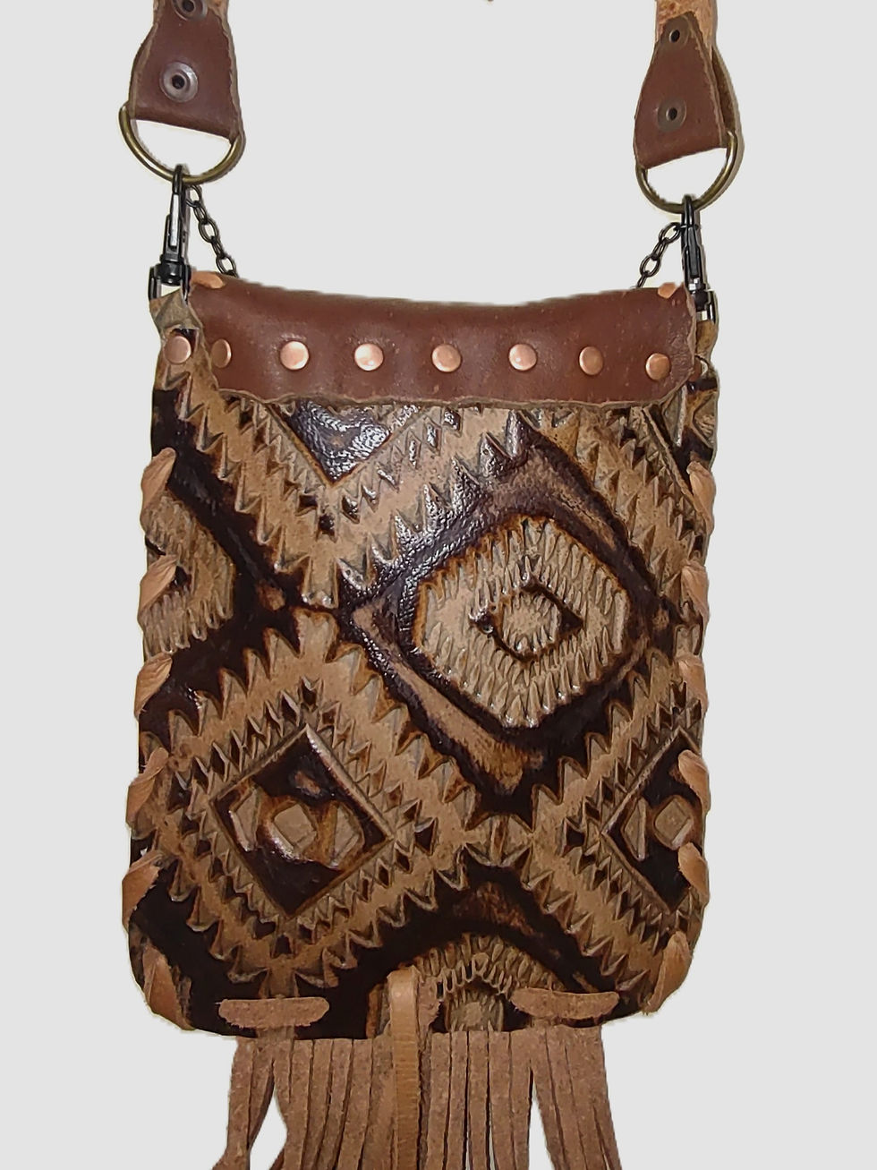 Thumbnail: Brown and tan southwest embossed leather, black deertan leather, laced