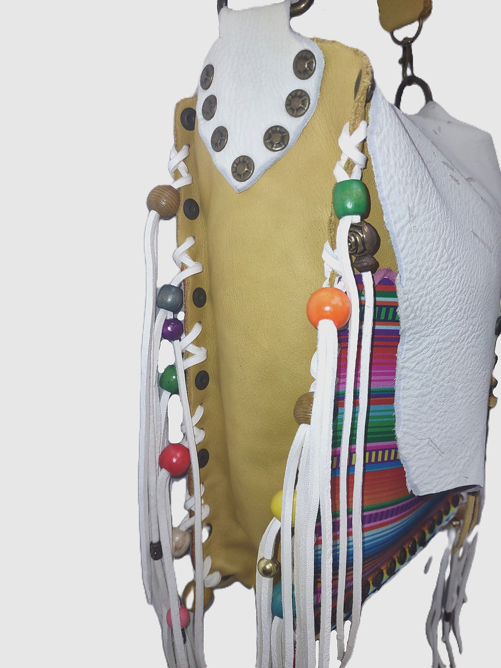 Thumbnail: Serape print, white soft and yellow deertan leather, silver plate arrow charm.