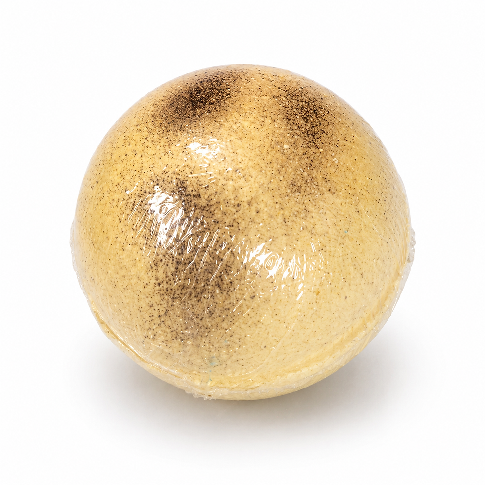 Cookie Dough round bath bomb with creamy beige colour and speckled top, handmade bath fizzer for a warm relaxing soak