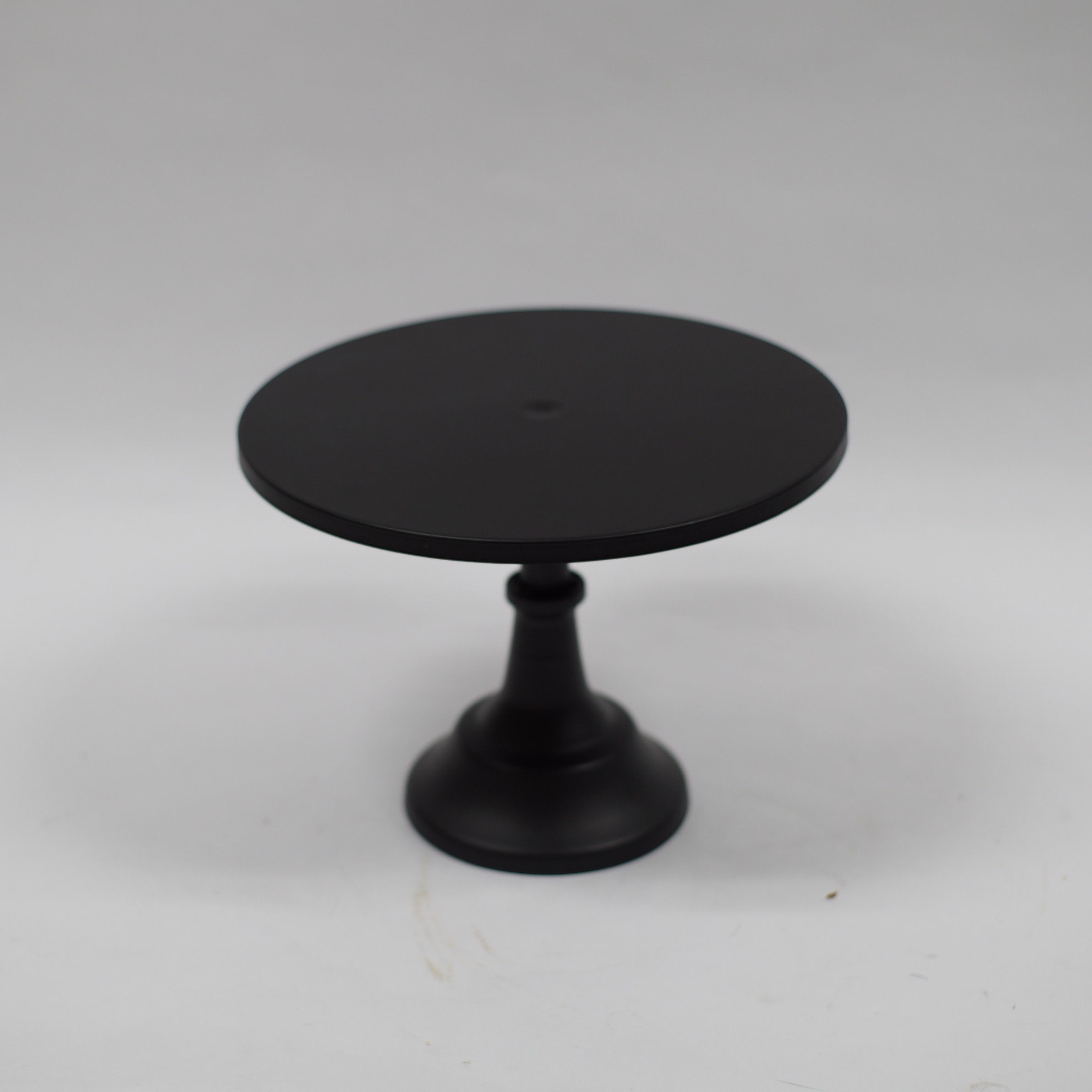 Black Metal Cake Stand with a Round Pedestal Base