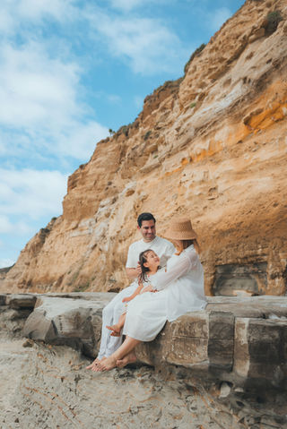 Outdoor family portraits San Diego rocky coastal location