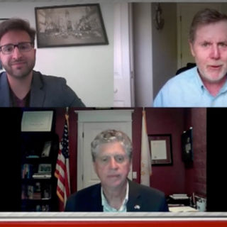 Governor Dan McKee and Christopher Parisi speaking with Dan Yorke