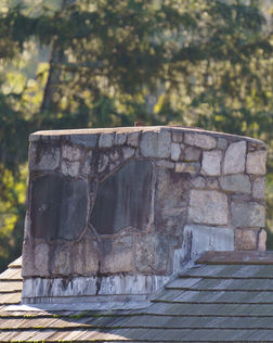 Chimney with a stone resembling a butterfly