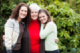 Grandmother, Daughter and Granddaughter hugging