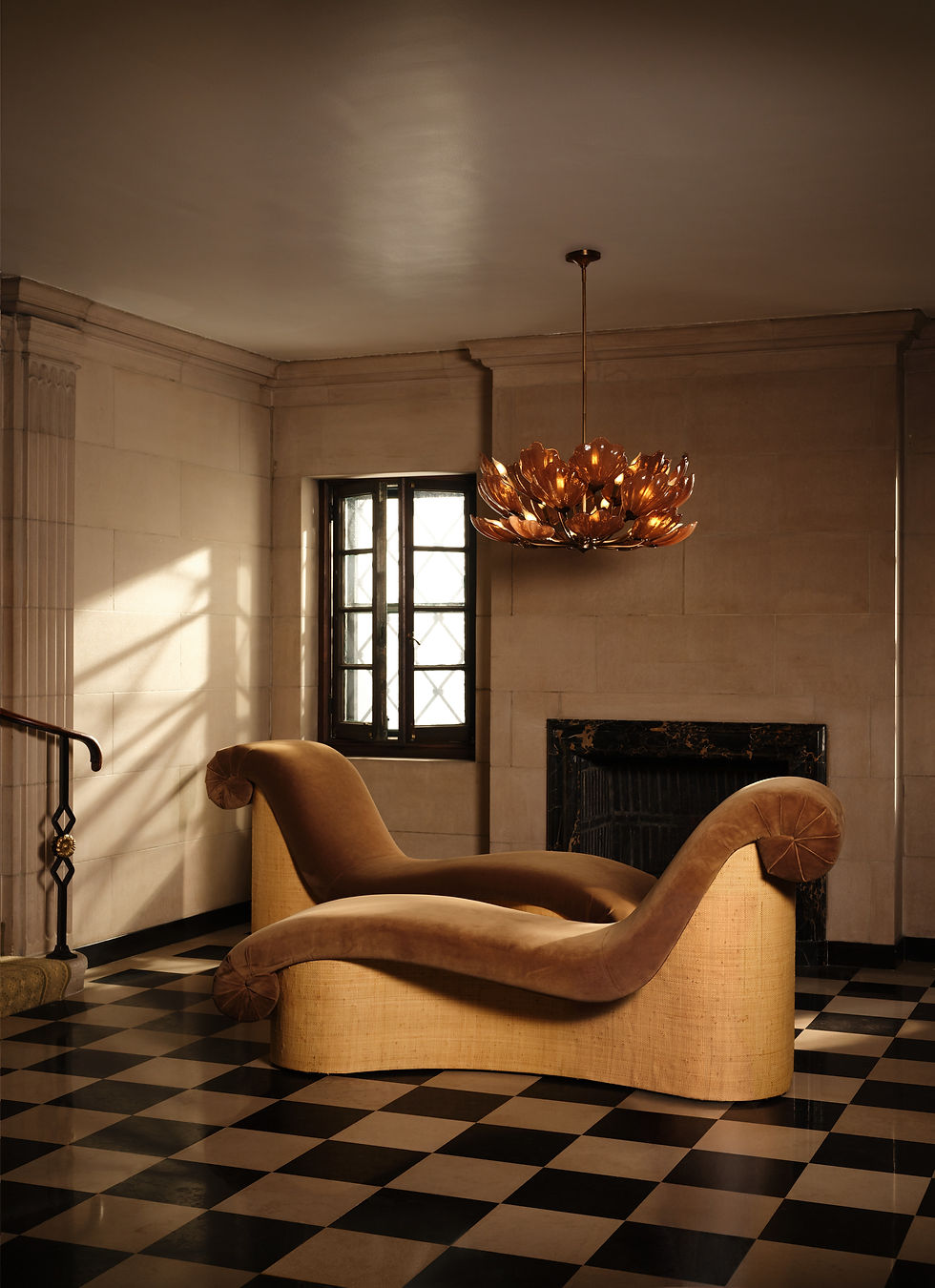Mystic Chaise Lounges beneath the Waltz Chandelier from the Howell × Harrier collection