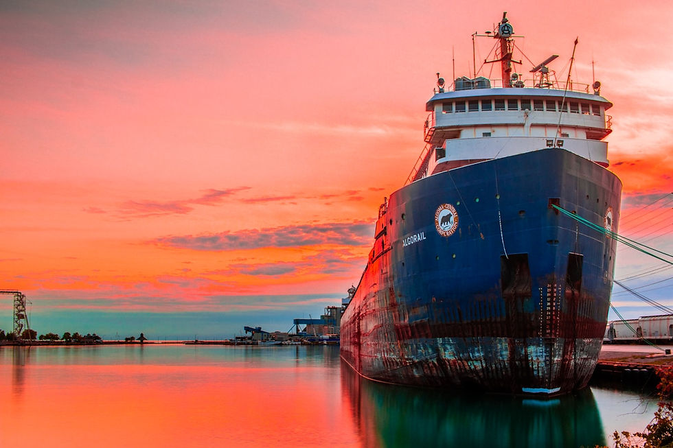 Cargo tanker ship crossing the Strait of Hormuz at dusk