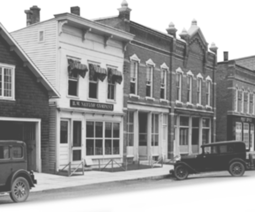 a street shot view of the front of the HW Naylor Building in Morris, New YOrk