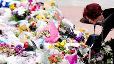 Sharon Osbourne laying a flower on Black Sabbath Bridge (Photo courtesy PA)