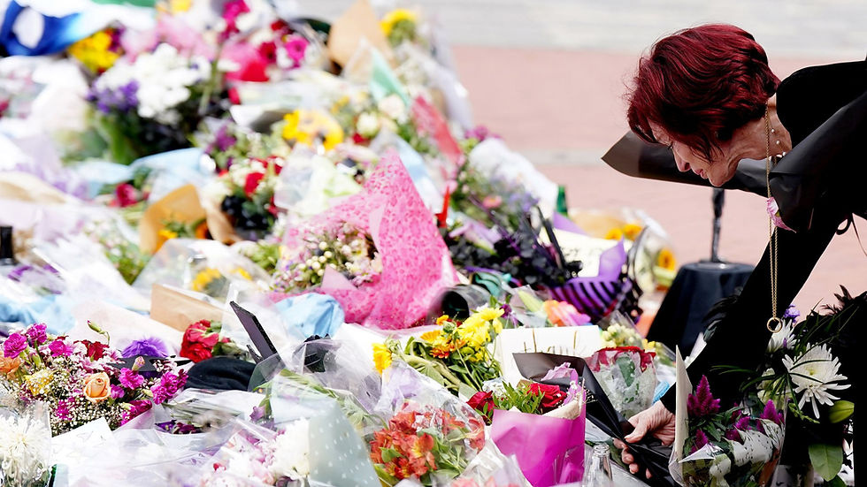 Sharon Osbourne laying a flower on Black Sabbath Bridge (Photo courtesy PA)