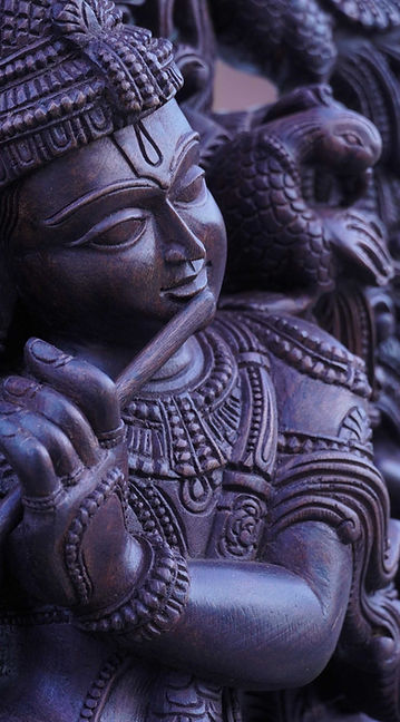 Hoysala krishna wooden statue
