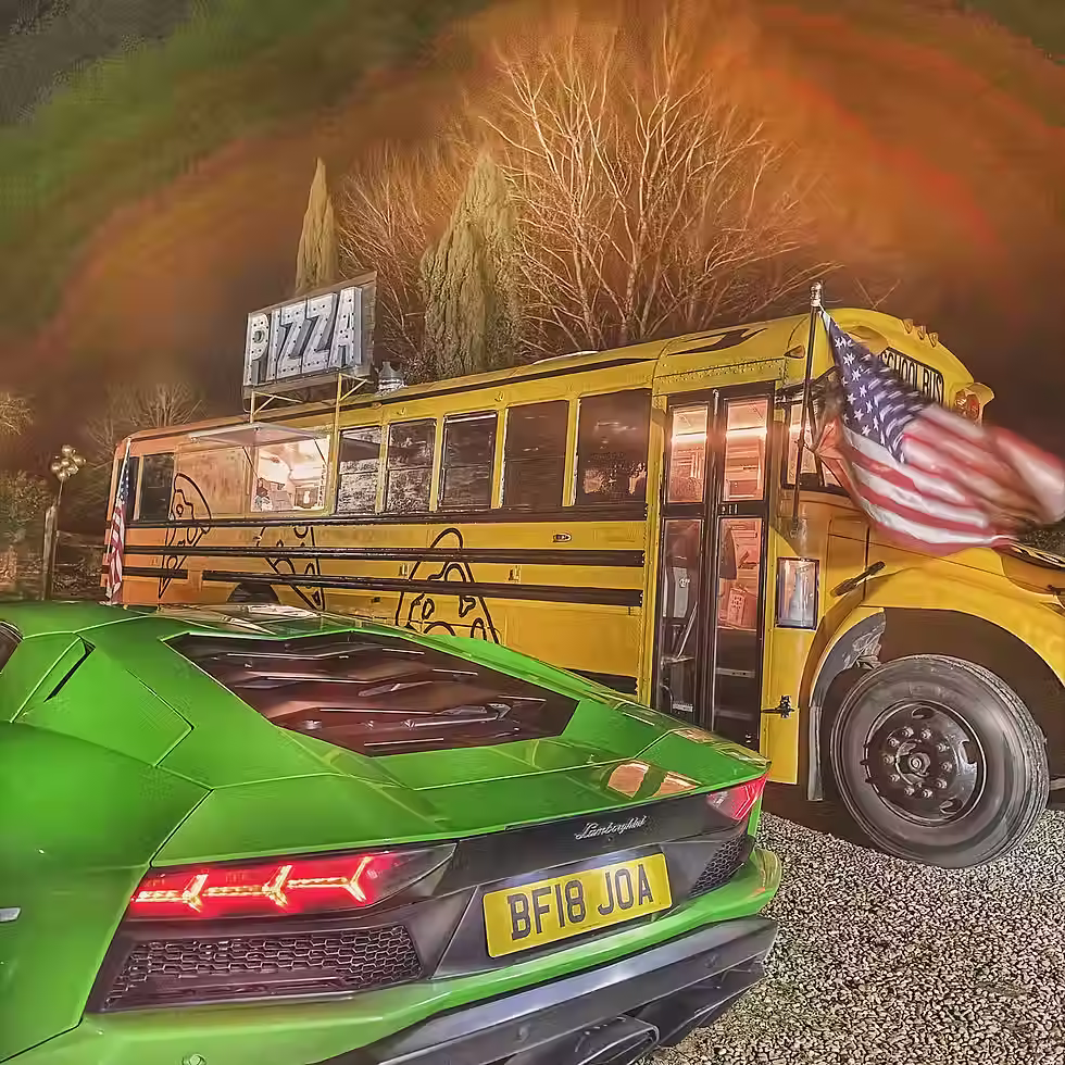 Lamborghini and Yellow American Bus