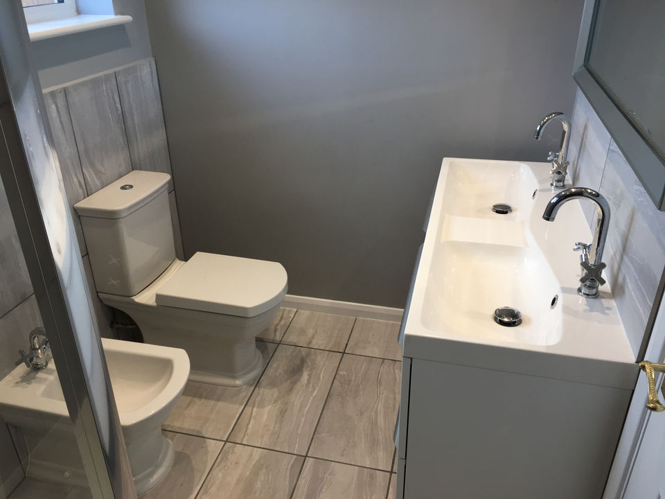 Elegant bathroom with professional tiling and modern design