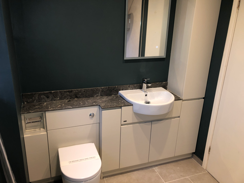 Installation of a new luxury bathroom suite, designed for both beauty and function. 