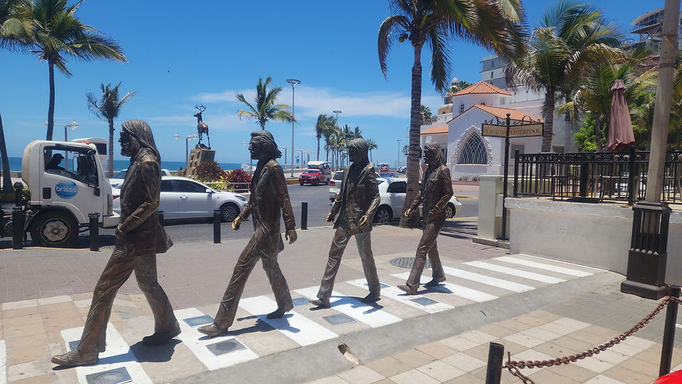 The Beatles crossing Abbey Road