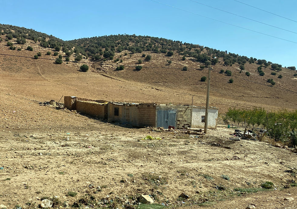 Small dwelling along the road