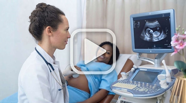 Doctor_holding_probe_pregnant_woman.jpg