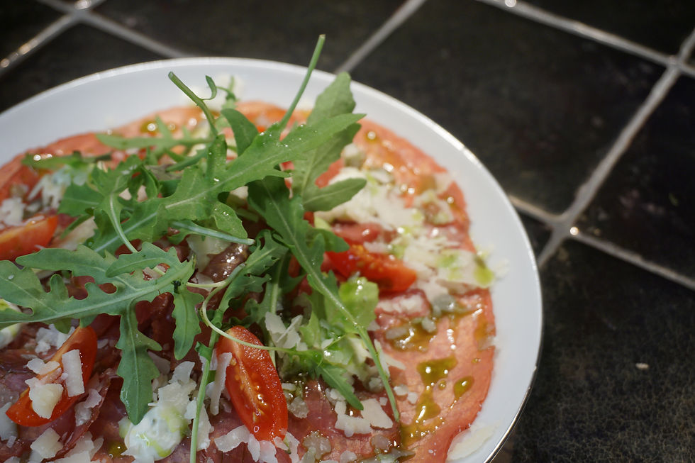 Carpaccio rund - Parmezaan - Basilicum - Rucola