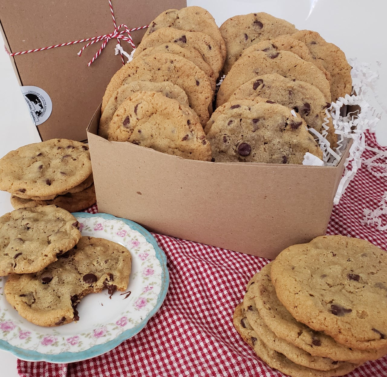A box and plate of our Classic Chocolate Chip cookies