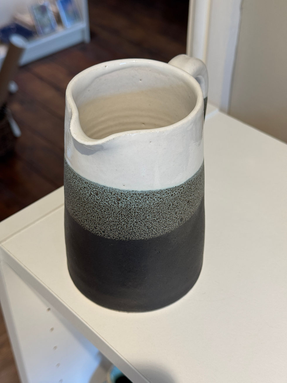 Thumbnail: Black grey white jug on white top