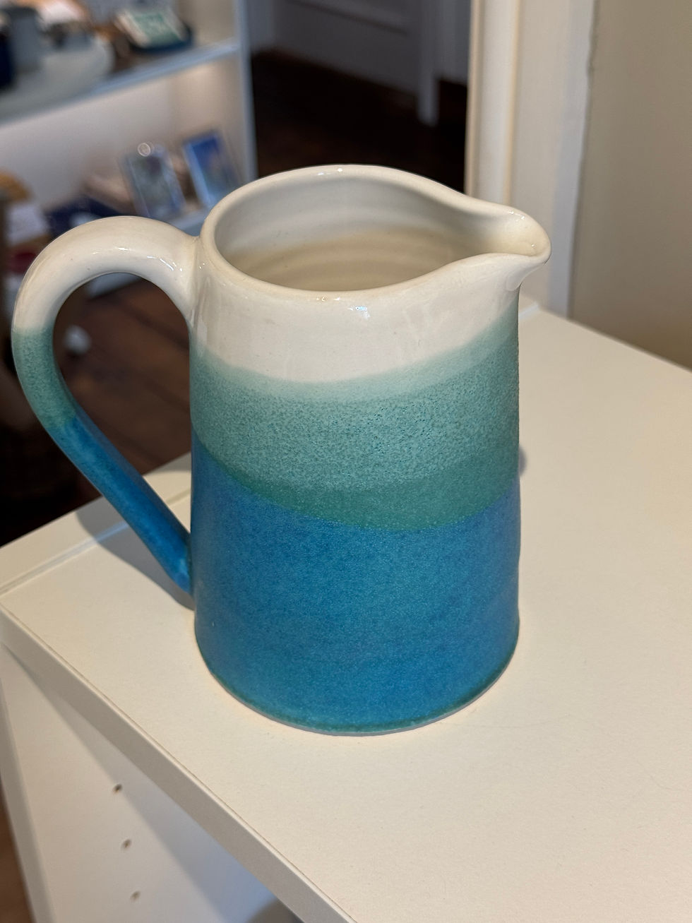 Thumbnail: Blue green white jug on white top