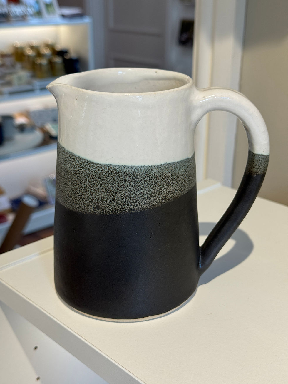 Thumbnail: Black grey white jug on white top