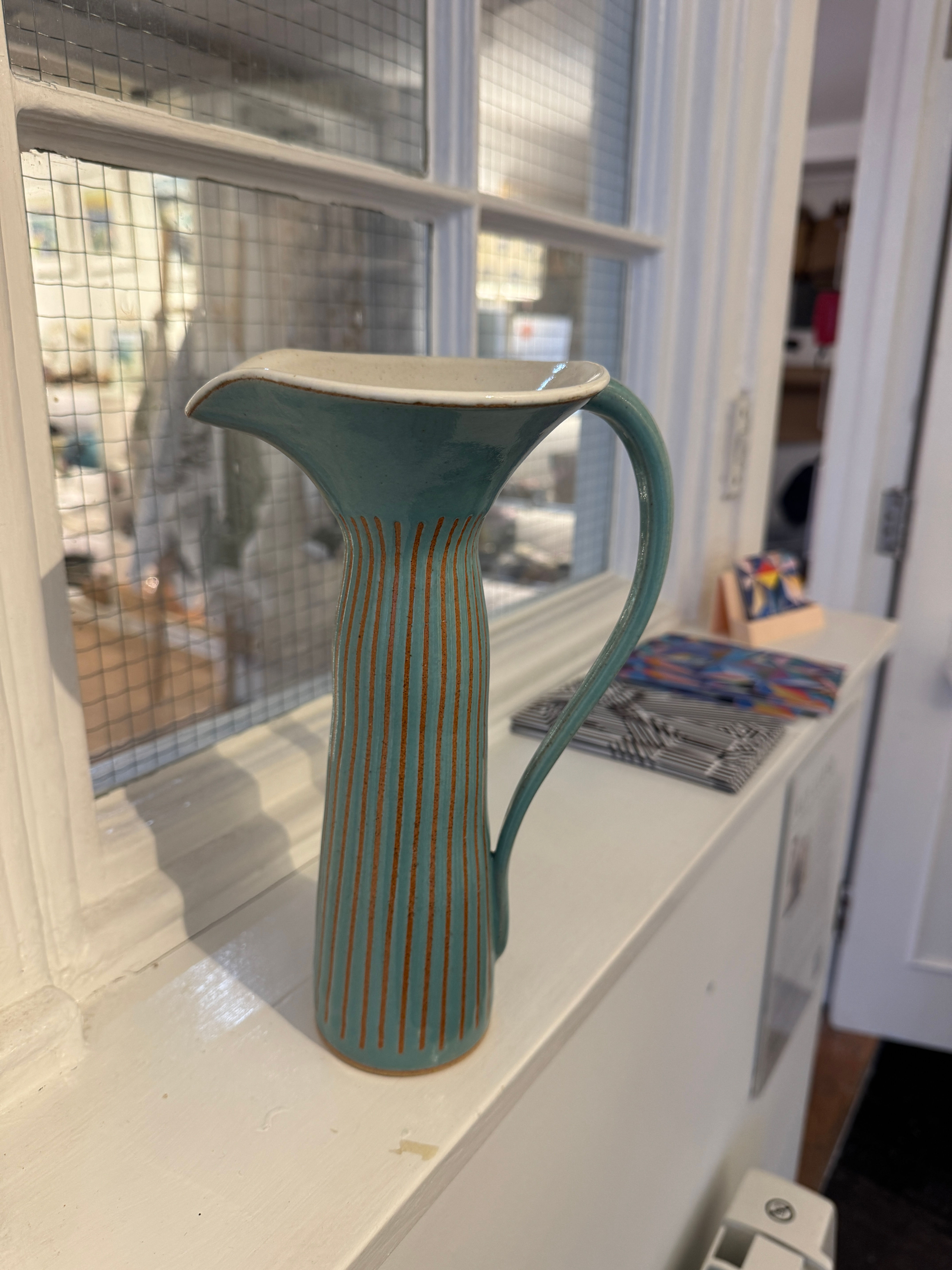 Light blue stripe jug with handle and large pouring spout
