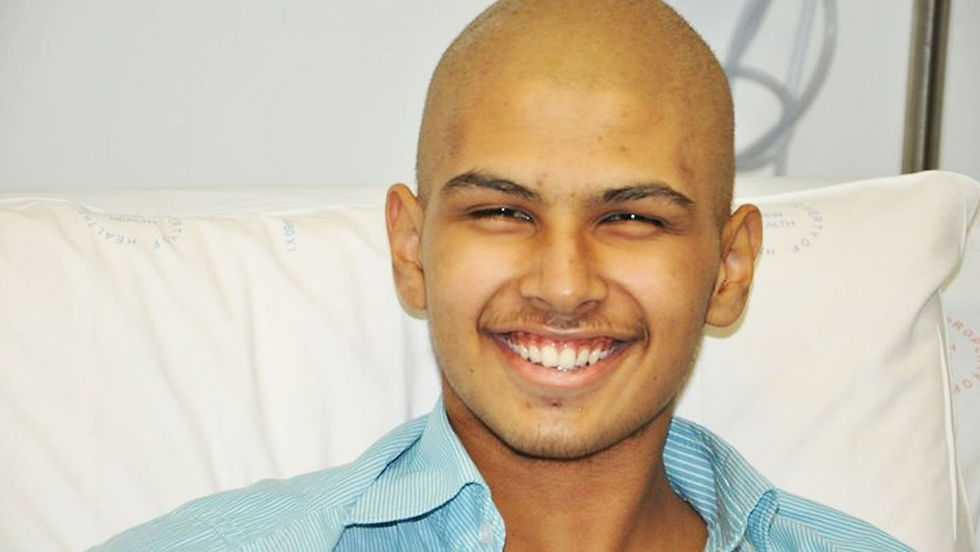 young man with head shaved