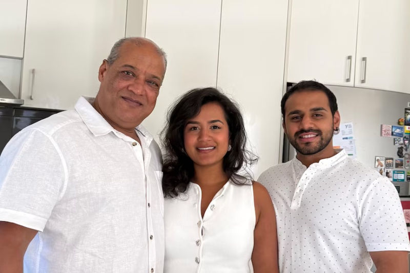 two men and a woman