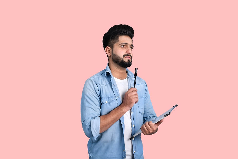 male student with pen and board