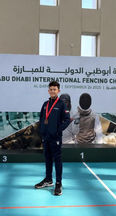 Knightsbridge Fencing Club Dubai fencer celebrating a bronze medal at the Abu Dhabi International Championship.