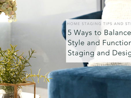 Cozy living area with a teal armchair and white textured cushion. A table holds vases, flowers, and plants. Soft, neutral tones throughout.