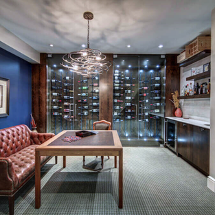 Occupied home staging entertainment room in Elbow Park, Calgary highlighting custom millwork and sophisticated styling.