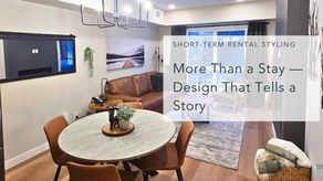 Modern living room with brown sofa, round table, and decor. Text reads "More Than a Stay—Design That Tells a Story." Cozy vibe