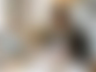 Parent reviewing student assessment reports at kitchen table