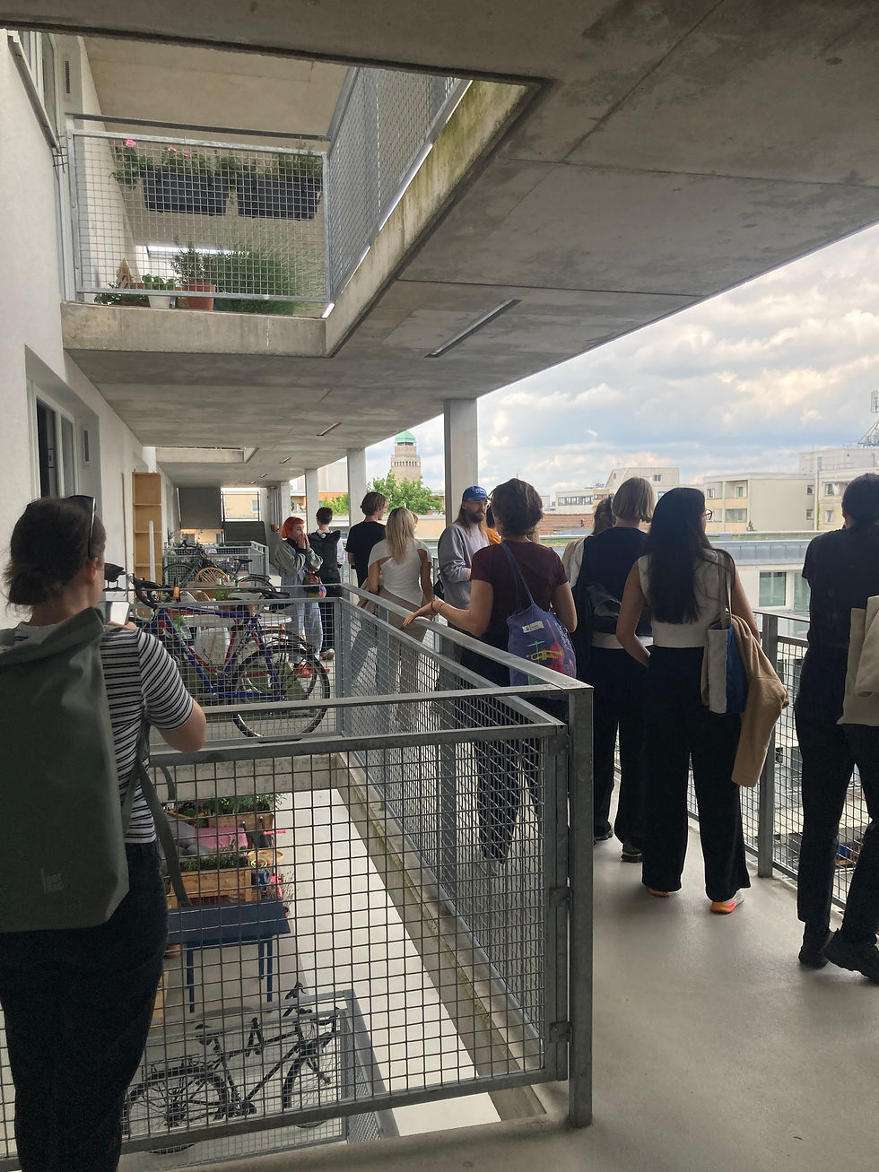 Residents and users share their experiences at Sp*ti Kiezladen and its residential complex, Berlin, 30 May 2025. Photo : Lorenza Manfredi