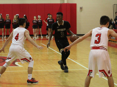 Spalding Can't Overcome Quickley's 33; Fall To John Carroll