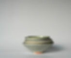 Handcrafted pottery bowls made from clay, featuring a unique, ocean like glaze.