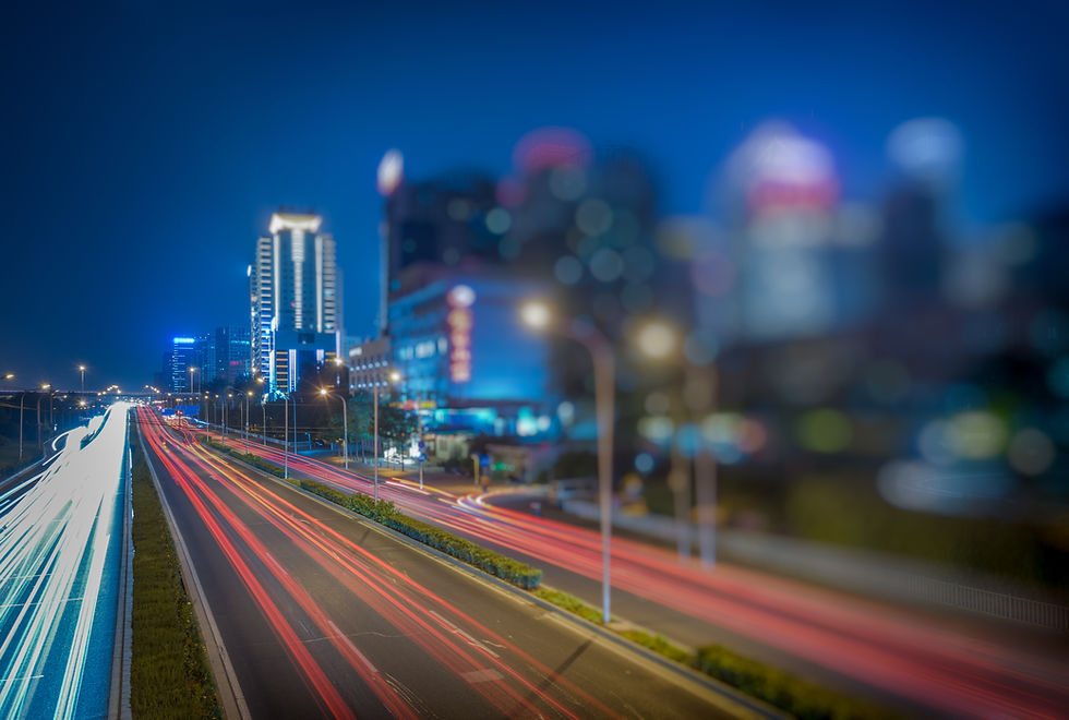 blurred-traffic-light-trails-road.jpg