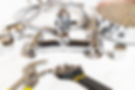 wrenches-closeup-and-disassembled-shower-faucet-2024-10-18-04-29-00-utc.jpg